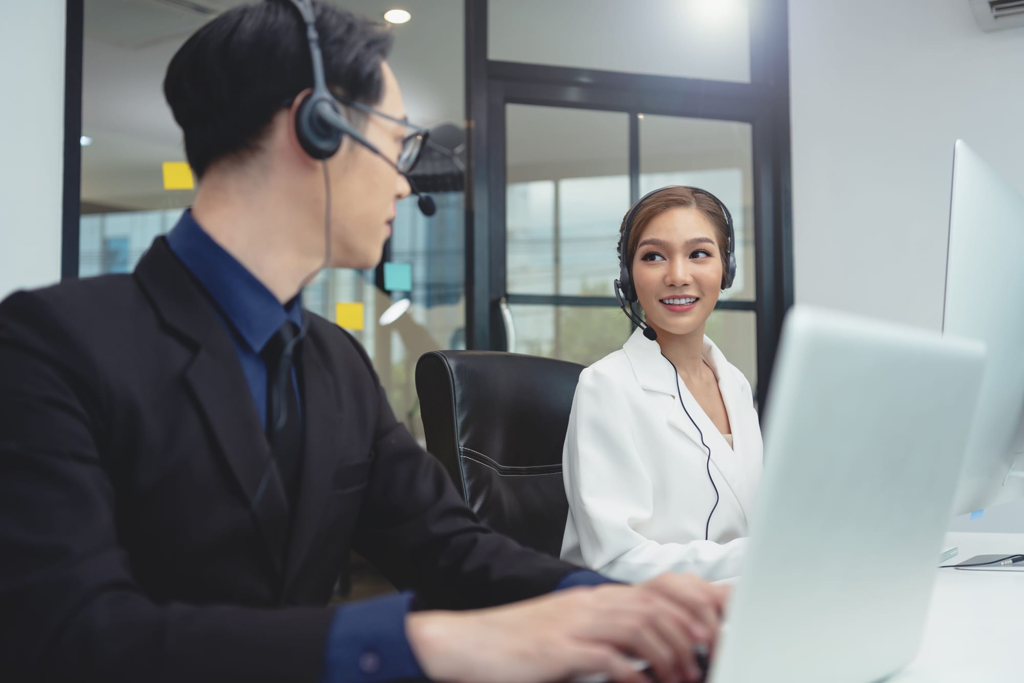 call-center-agent-team-customer-service-support-wearing-headset-headphone-talking-with-customer (1).jpg